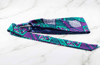Satin lined-headband in purple, turquoise, navy blue, and white.
