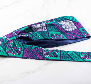 Satin lined-headband in purple, turquoise, navy blue, and white.