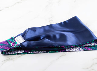 Satin lined-headband in purple, turquoise, navy blue, and white.